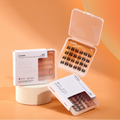 CoreLash Day Set packaging on an orange background, includes three bestselling self-adhesive lash clusters for doll, foxy, and lower-lash looks. Easy to apply, no glue needed. 